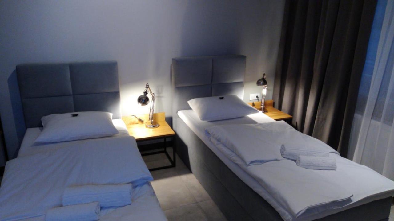 Apartsuites I Sorau ซารี ภายนอก รูปภาพ A room at the hotel