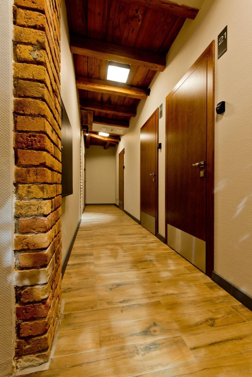 Apartsuites I Sorau ซารี ภายนอก รูปภาพ A corridor in a hotel