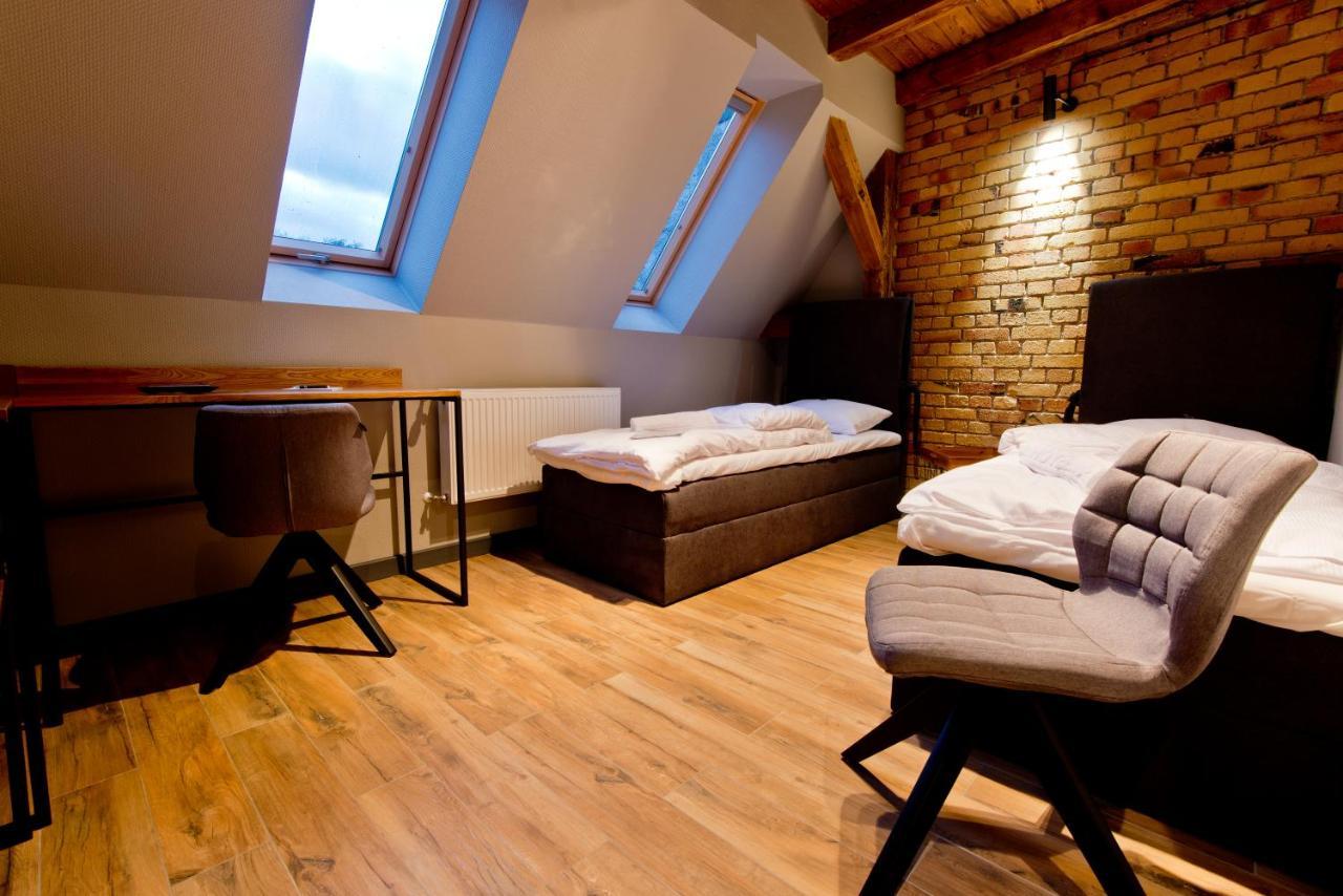 Apartsuites I Sorau ซารี ภายนอก รูปภาพ A room at the hotel