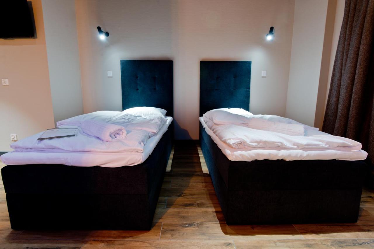 Apartsuites I Sorau ซารี ภายนอก รูปภาพ A room at the hotel