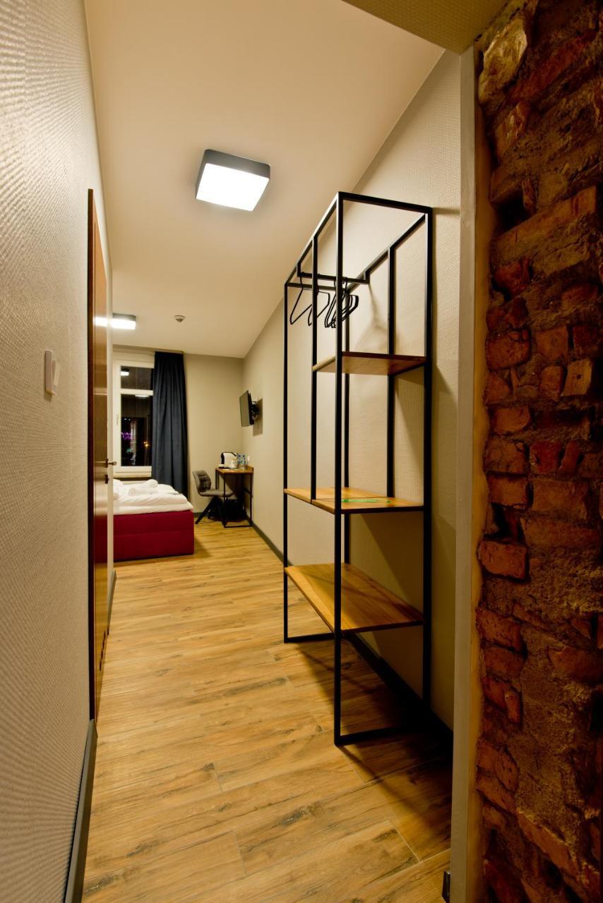 Apartsuites I Sorau ซารี ภายนอก รูปภาพ A room at the hotel