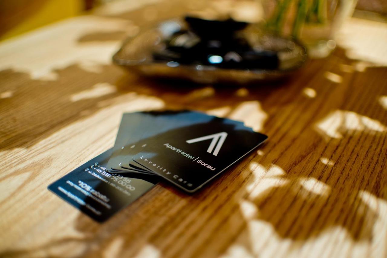 Apartsuites I Sorau ซารี ภายนอก รูปภาพ A business card