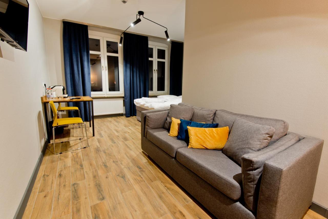 Apartsuites I Sorau ซารี ภายนอก รูปภาพ A typical studio apartment in Berlin, Germany
