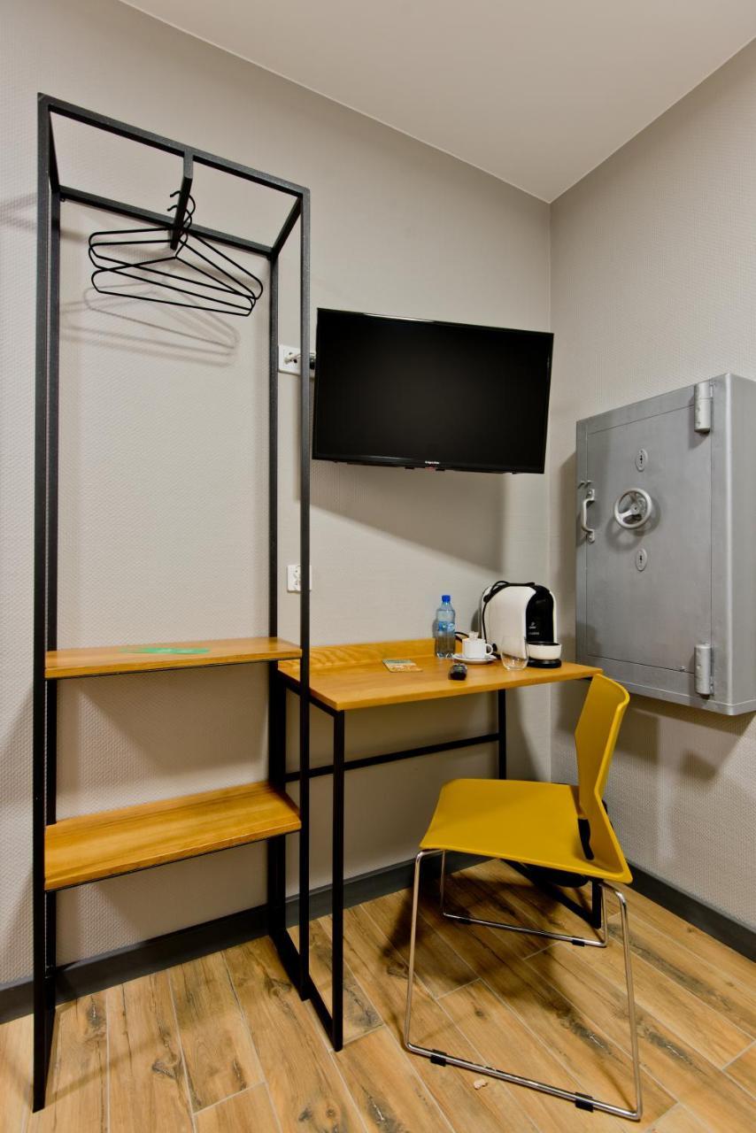 Apartsuites I Sorau ซารี ภายนอก รูปภาพ A room at the hotel